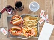 in-n-out burgers and fries with wine