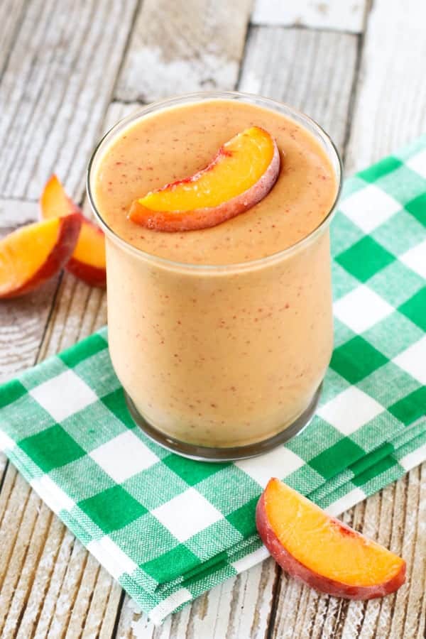 peach cobbler smoothie in a clear glass