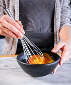 whisking eggs and oil for gluten-free pasta recipe