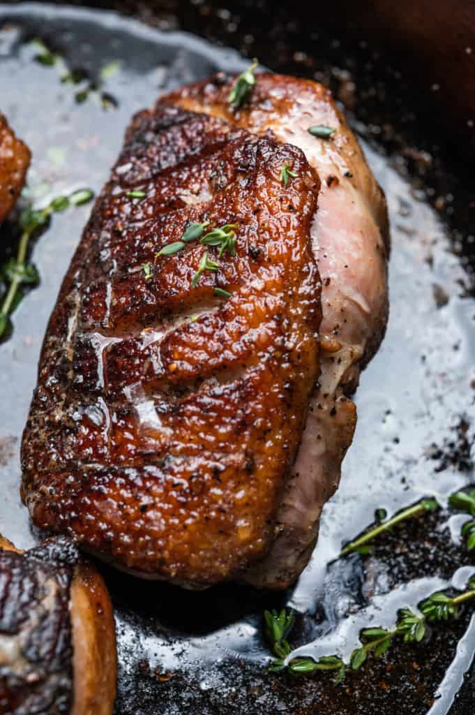 a beautifully cooked duck breast in the pan
