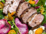 how to cook duck breast: perfectly cooked duck breast on salad