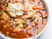 bowl of minestrone with dumplings soup