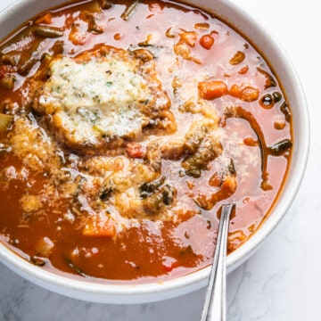 bowl of minestrone with dumplings soup