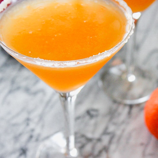 Tangerine martini with sugar rim