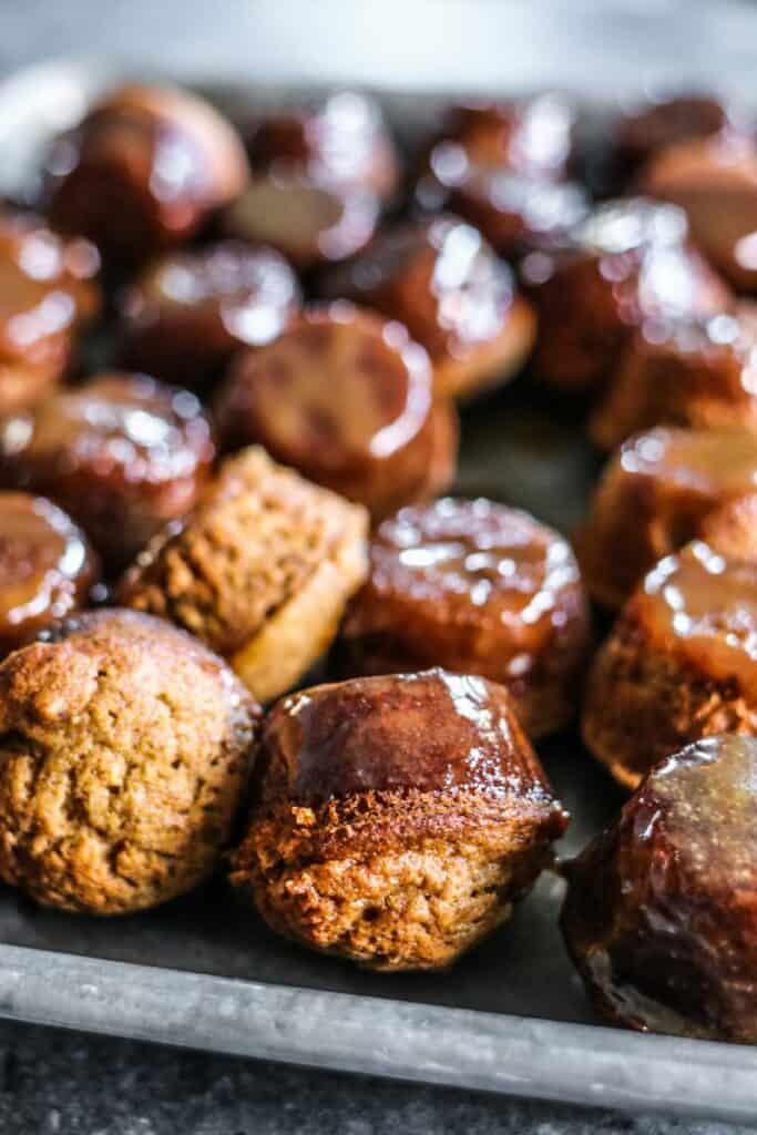 sheet pan full of mini sticky toffee puddings