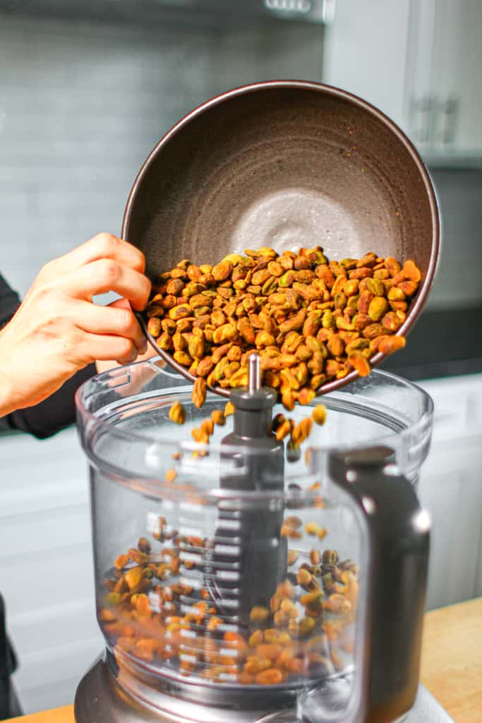 Add pistachios in a food processor 