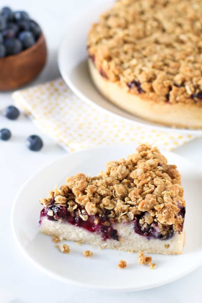 vegan blueberry coffee cake with a slice out