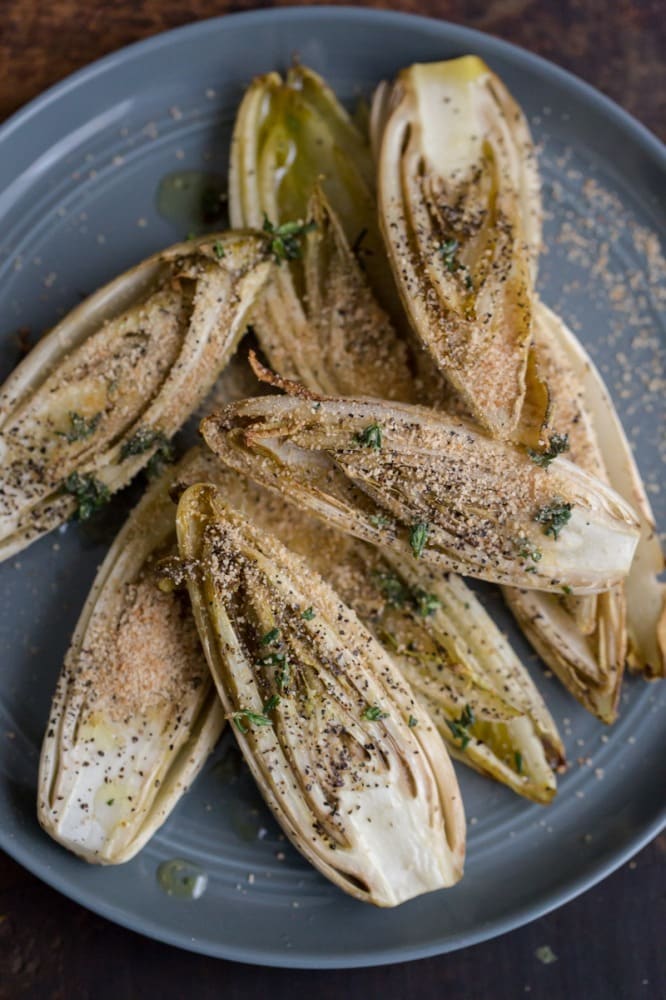 ROASTED ENDIVES WITH THYME in a dish