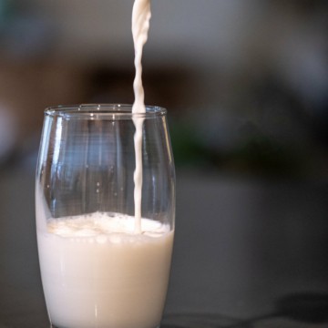 pouring a milk into a glass