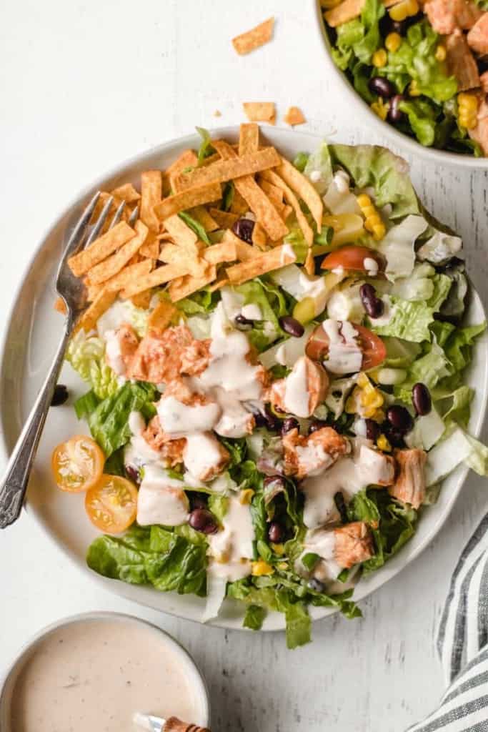 A Southwest chicken salad from Wheat by the Wayside with tortilla strips, beans, tomatoes and creamy dressing