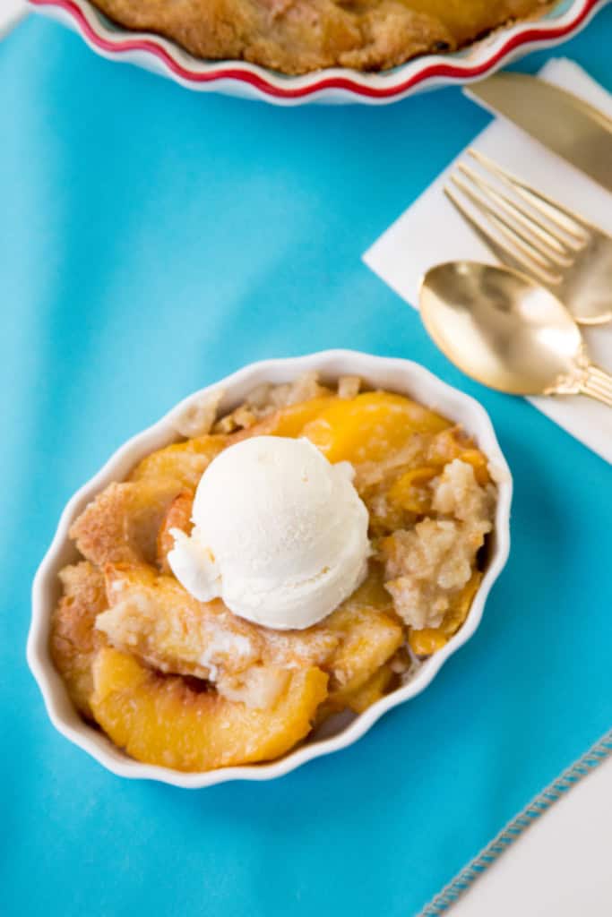 dish of fruit cobbler with ice cream