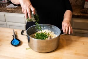 making filling for Rice Stuffed Grape Leaves Recipe: Yalanchi Sarma with parsley