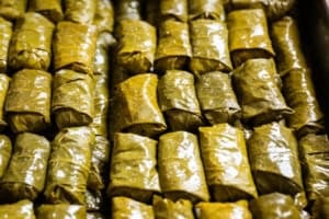 a bunch of Rice Stuffed Grape Leaves